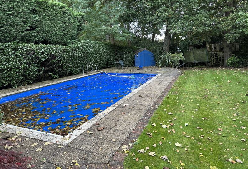 Before Installation of a Poolside Room with Bi-folding Doors, Outdoor Shower & Sauna in Surrey
