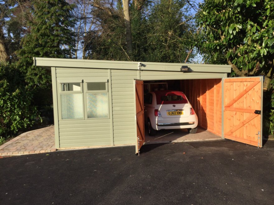25sqm Albatross garage with incorporated studio and partitioned store painted in Sadolin Superdec 'Jungle green'