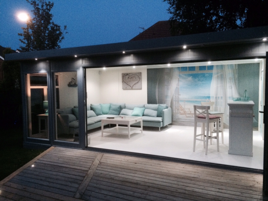 This beautiful bi-folding garden room is perfect for entertaining or just relaxing on a warm summer's night