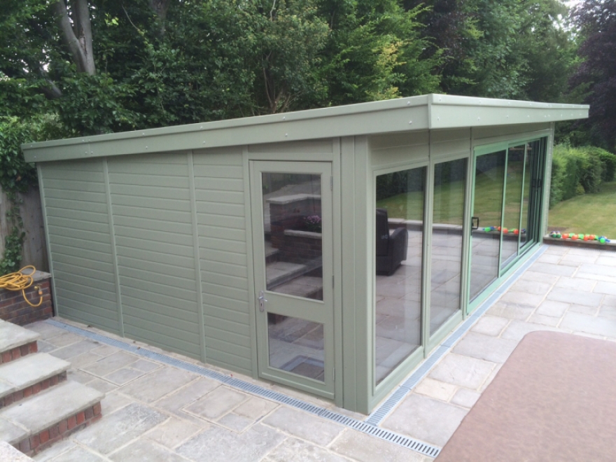 Beautifully finished 7m x 4,25m summerhouse with EndlessÂ® pool room, featuring painted tricoya cladding to front & side