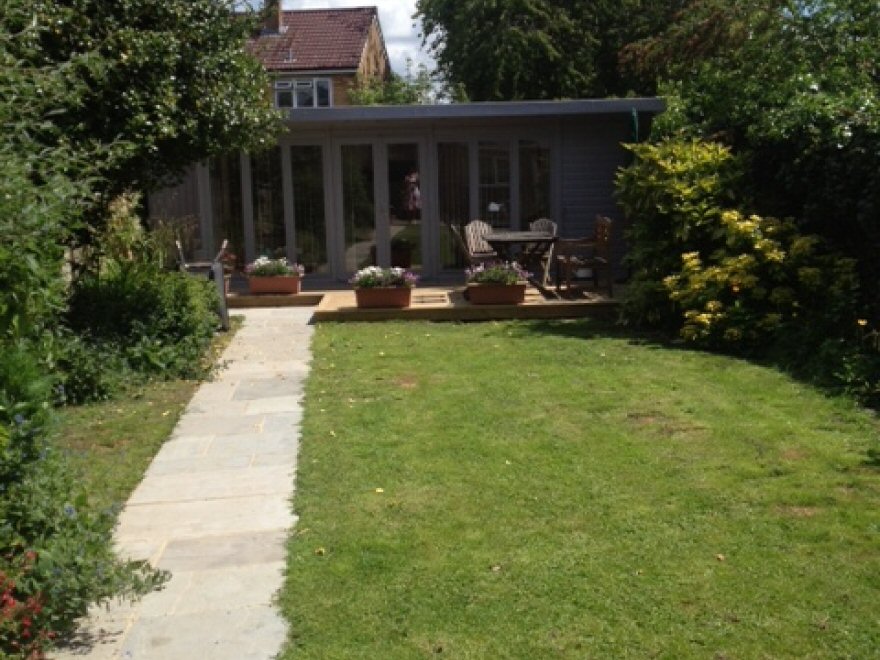 Beautiful combination garden room nested at the end of the garden