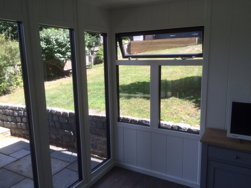 Full drop frontal windows and three qurter side windows offer great views of the garden