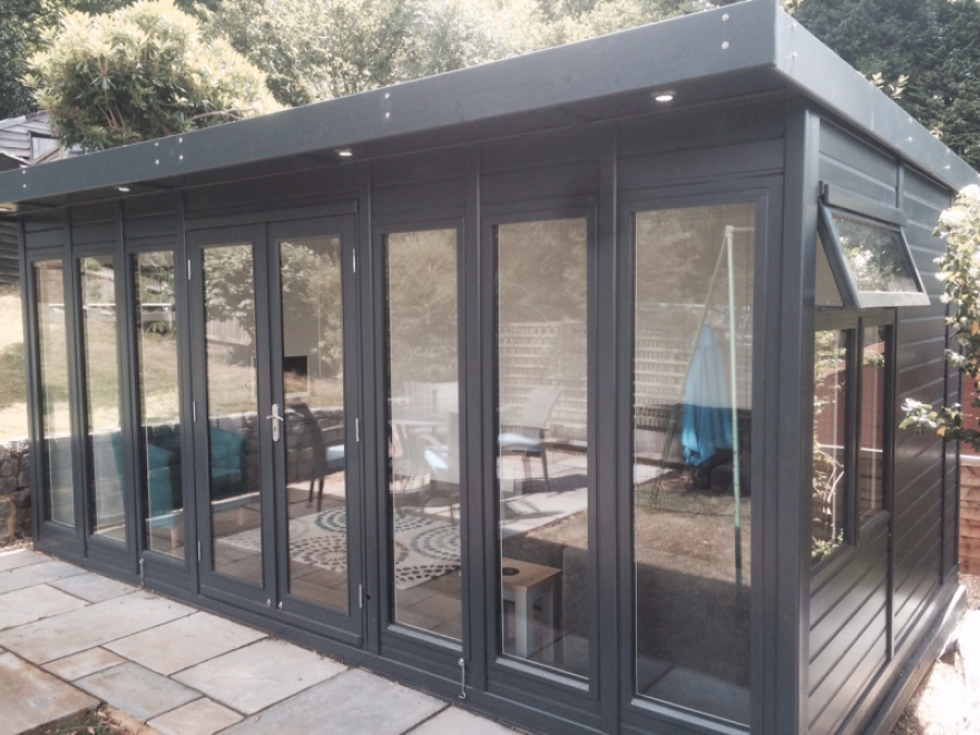 This stunning summer house has been painted in 'Anthracite' for a sleek appearance