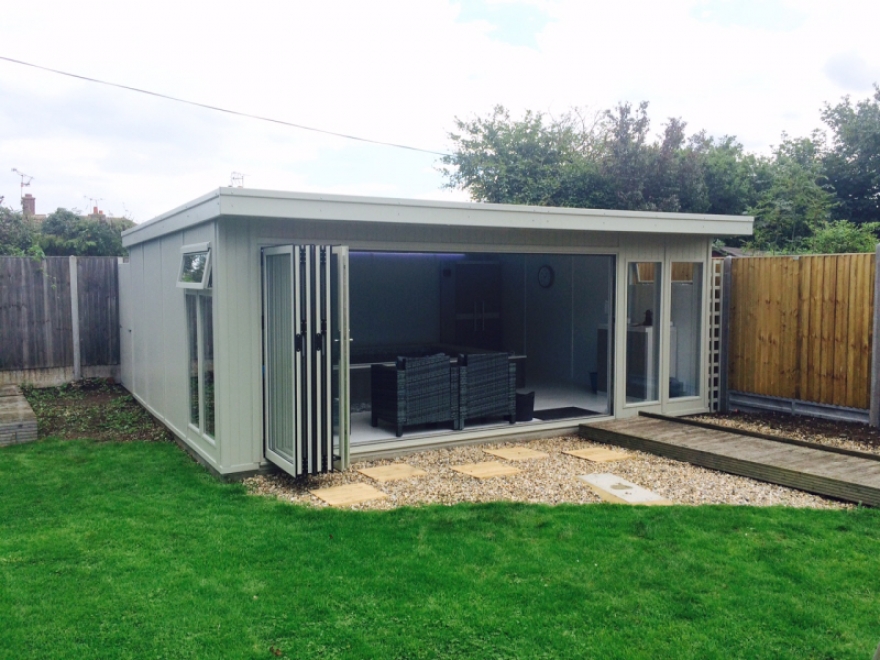 The front and left hand sides of this summer-house have our v-groove tricoya cladding upgrade