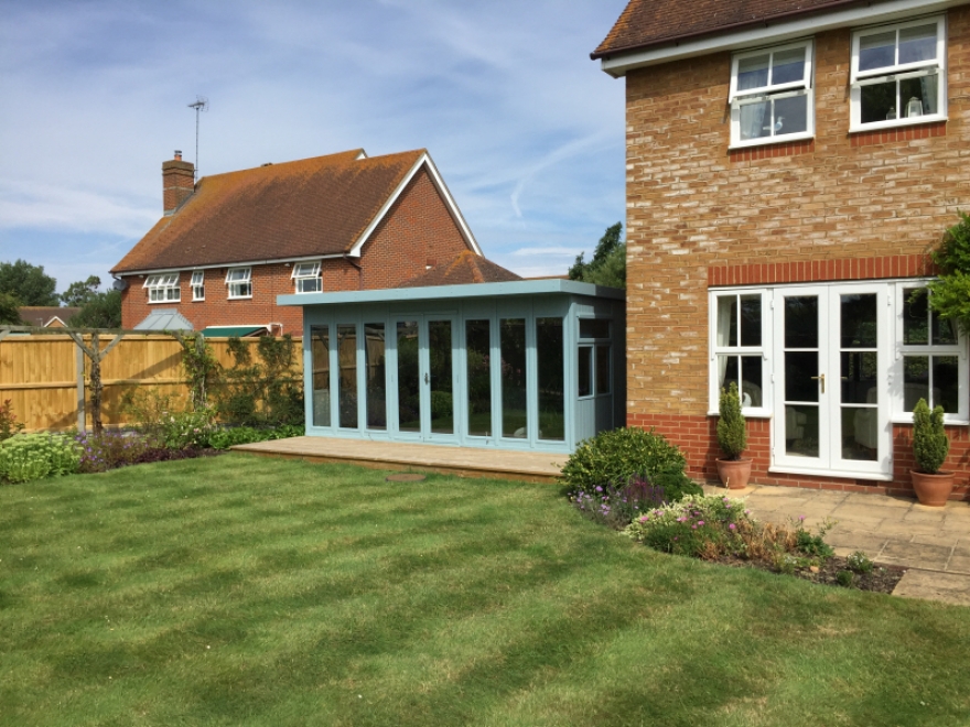 5 meter front has great proportions from every angle,h. Sat back from the rear of the house by 500mm means it does not dominate the garden and looks very considered. Side window not full drop to give a more enclosed feel to the room