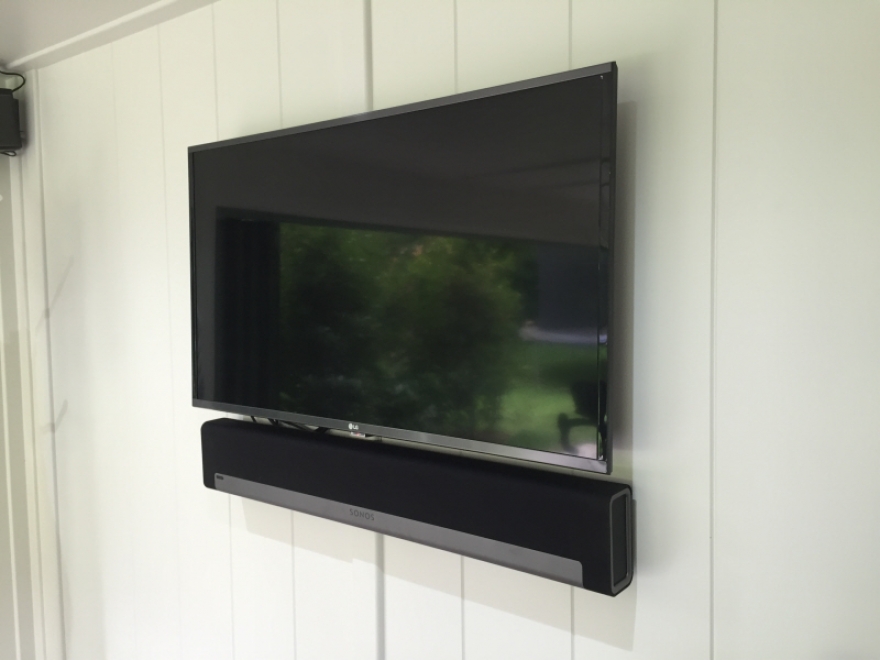 Both flat screen TV's have been wall mounted with cables cleverly concealed for a tidy appearance