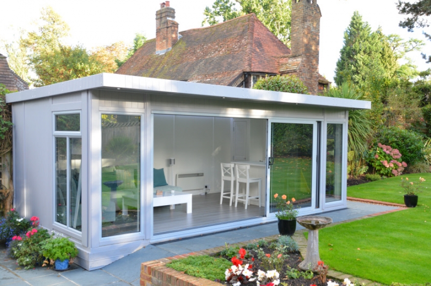 Garden rooms with trisliding doors Bakers Garden Buildings