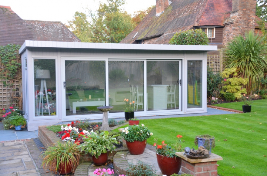 The 3 door Tri-slider give huge glass area, and feels perfectly integrated with the garden open or closed
