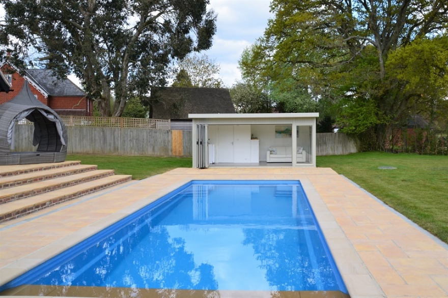 View of the poolside summer house from the far end of this stunning 'Compass' pool