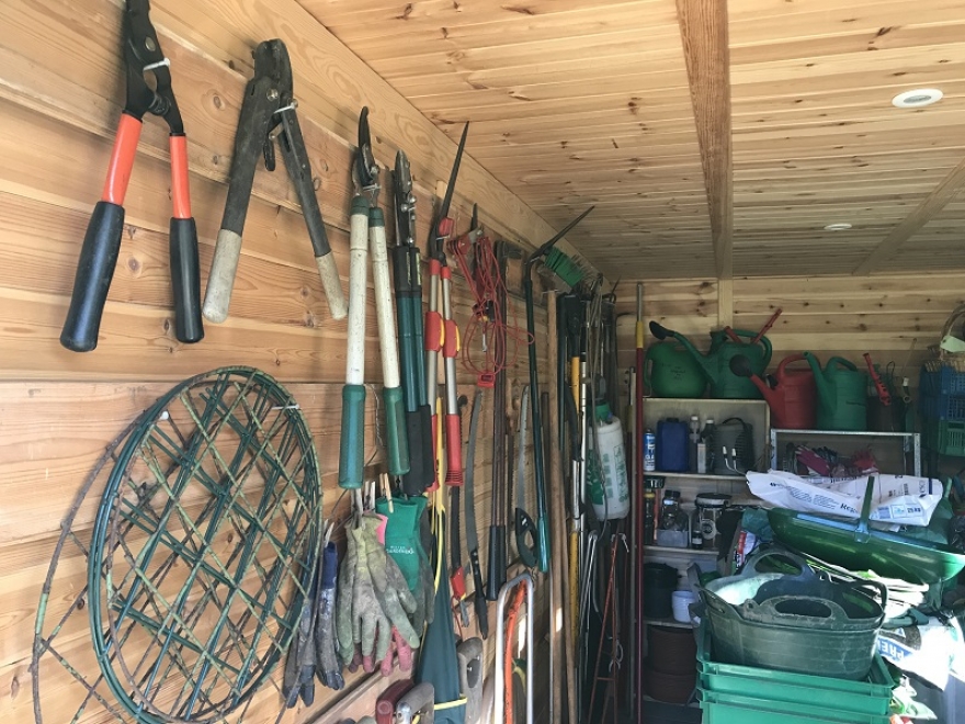 This building has ample storage for garden equipment and beyond!