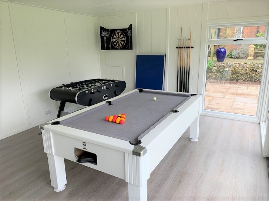 Kids garden den with pool table