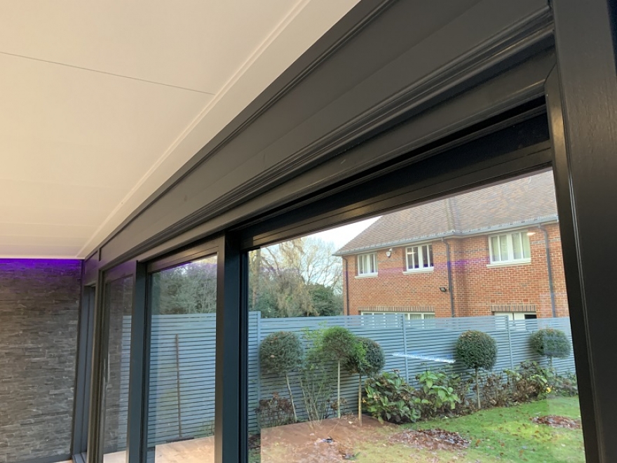 Aluminium tri-sliding doors  in anthracite RAL7016 are colour matched to the exterior of the building