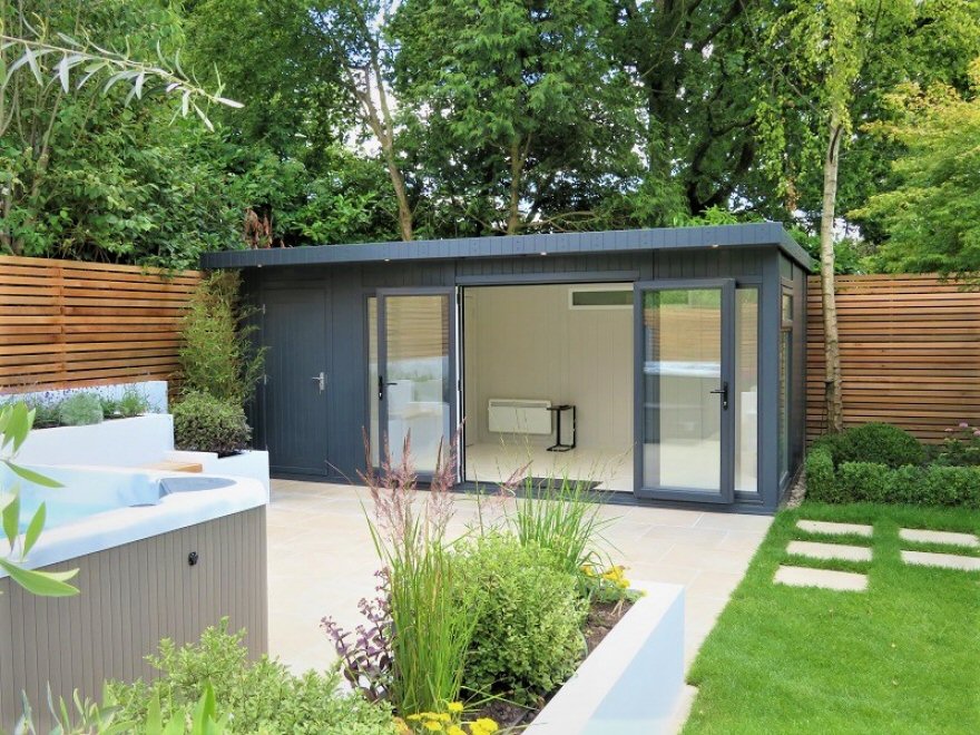 A contemporary summer house with storage area and changing room for hot tub use