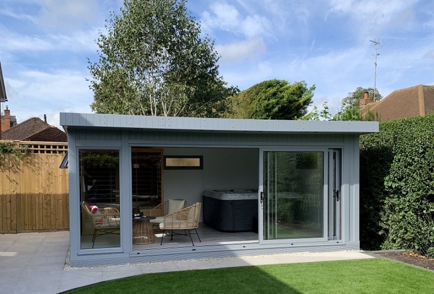 This stunning relaxing space was designed to contain a sauna and hot-tub, featuring extra wide tri-sliding doors which open in both directions for flexibility 