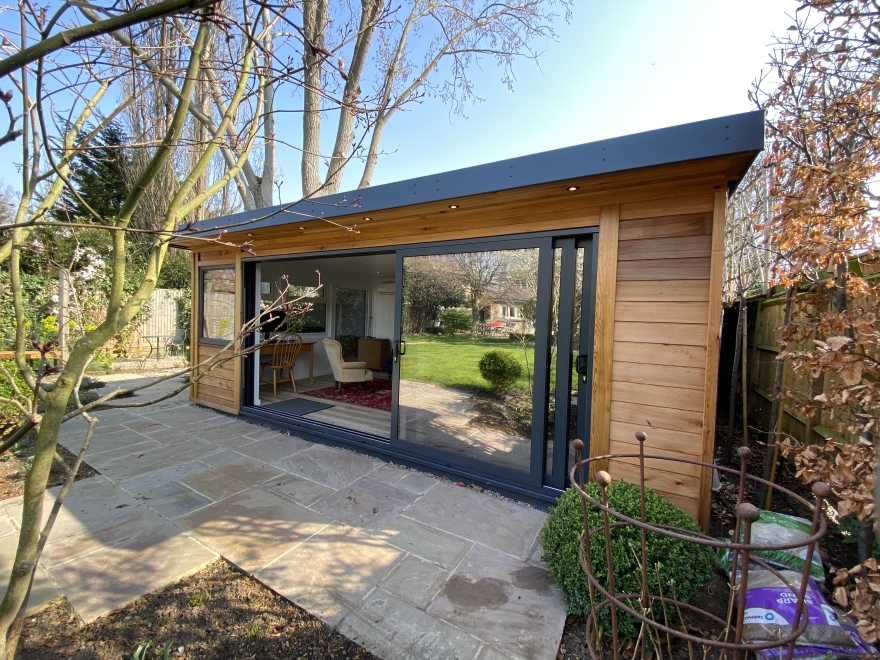 Garden rooms with trisliding doors Bakers Garden Buildings