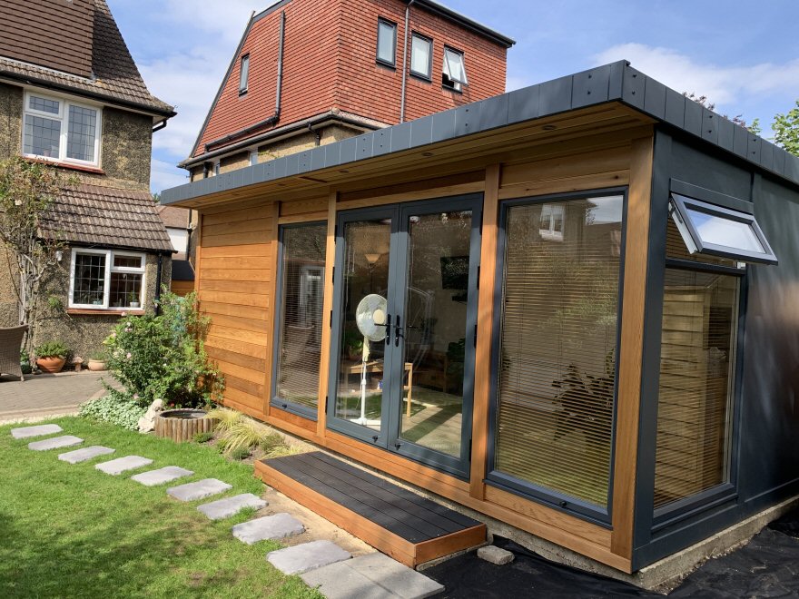 Cedar summerhouse with Anthracite doors and windows 