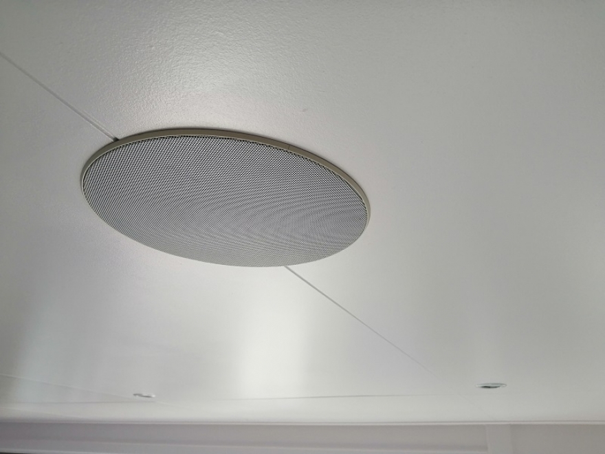 Ceiling speakers linked by Wi-Fi to outside speakers and main house