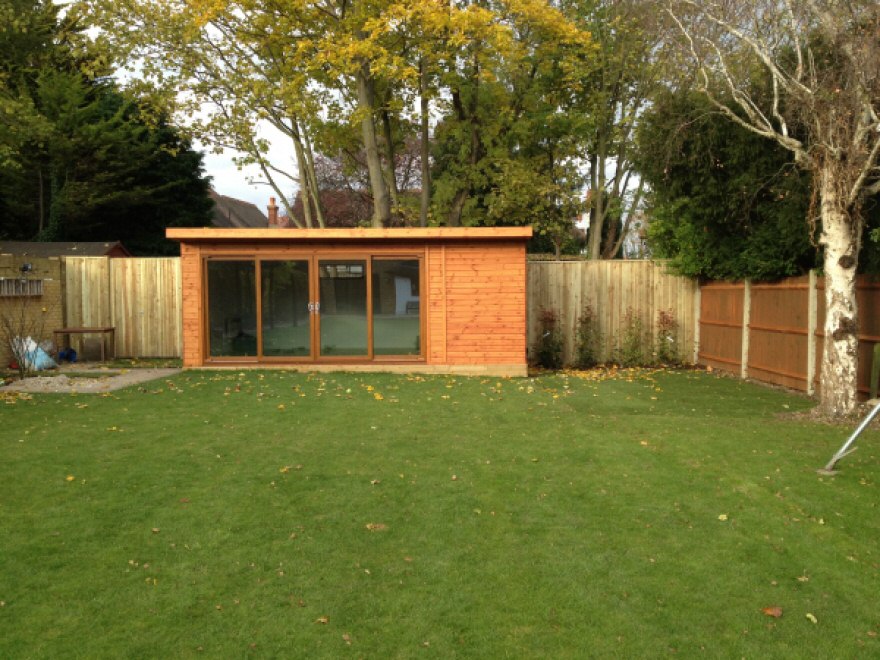 Combination 4-Pane Sliding Garden Room with timber surround fencing