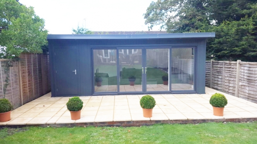 Combination UPVC sliding door and store in anthracite 