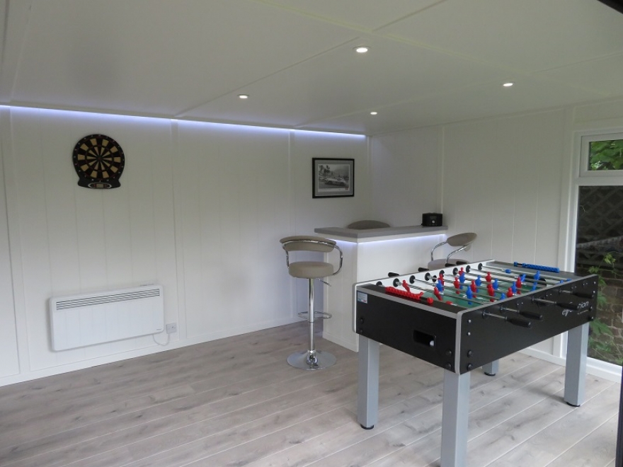Garden Games room Complete with Table Football, Darts and a Bar Installed in Twickenham, Middlesex
