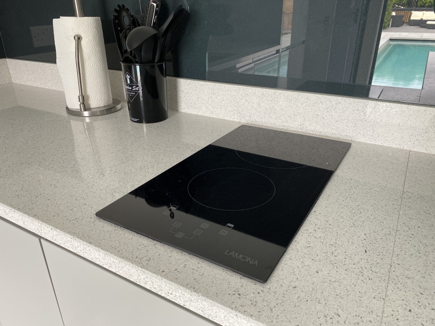 Induction hob  in a summer house kitchen 
