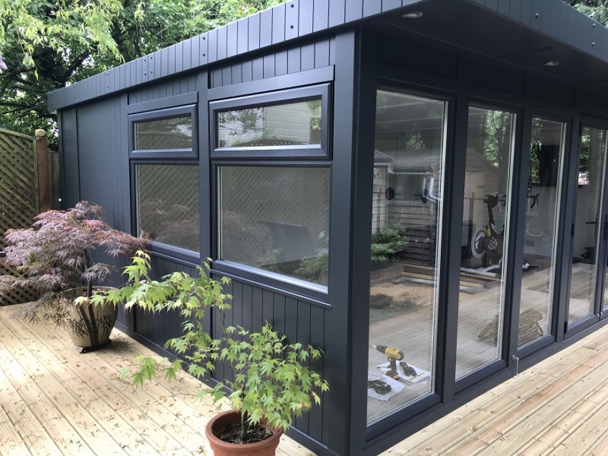 Multi-purpose Office/Summerhouse/Games Room/Gym Painted in Anthracite with Matching UPVC windows & Doors in Ashtead Surrey