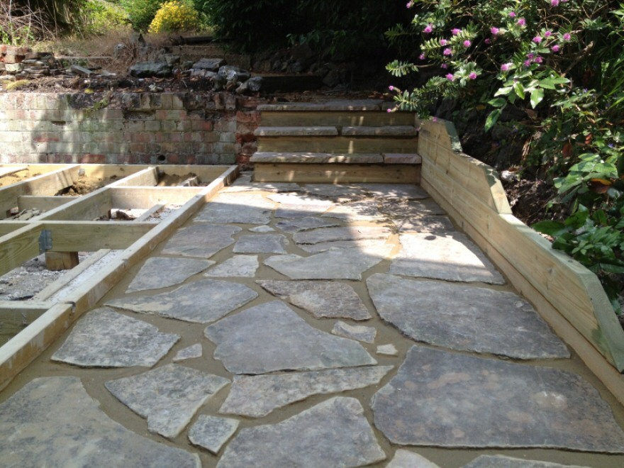 Original York stone re-laid with rustic weathered poiting complete