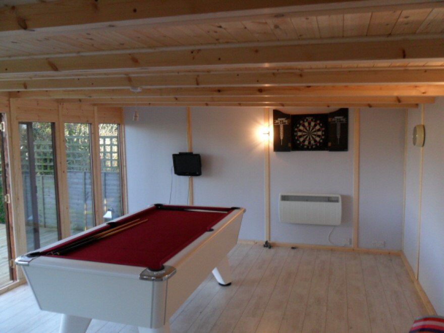 Pool table, dart board and our standard heater