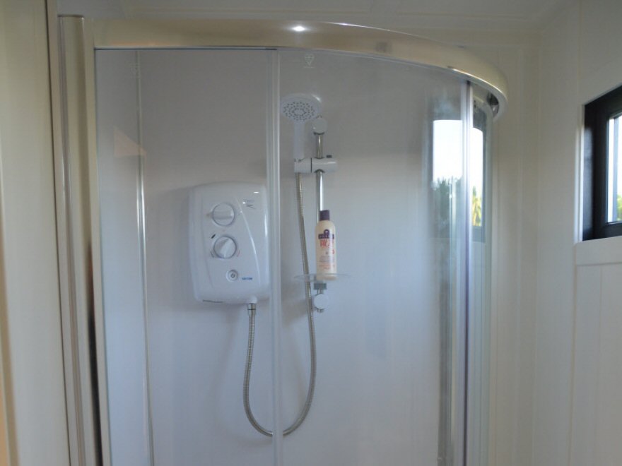 Power shower and cubical all completed by Bakers  