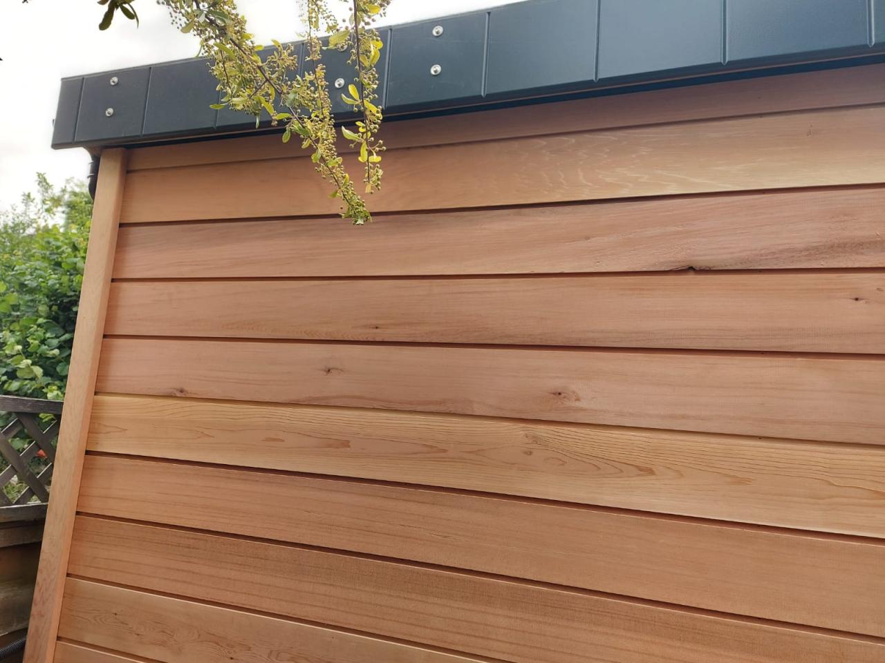 This was the first building delivered by us that used the popular option of cedar cladding. 

They wanted to enjoy the benefits of our modern construction techniques but still want a traditional look for their garden rooms. 
